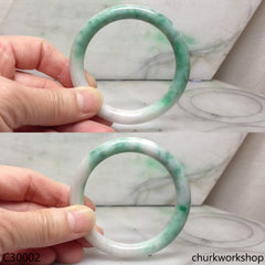 White base with splotches green jade bangle