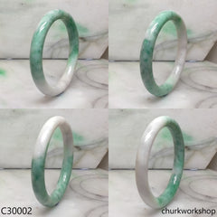 White base with splotches green jade bangle