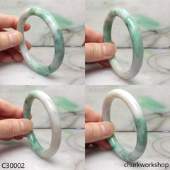 White base with splotches green jade bangle