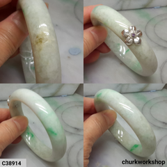 White base with splotches green jade bangle