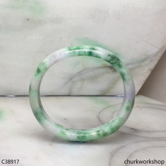 White base with splotches lavender & green jade bangle