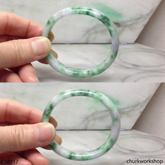 White base with splotches lavender & green jade bangle