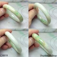 Small light green base with splotches apple green jade bangle