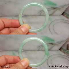 Small light green base with splotches green jade bangle