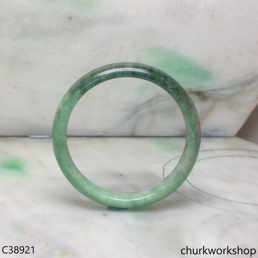 Small green base with splotches bluish green jade bangle