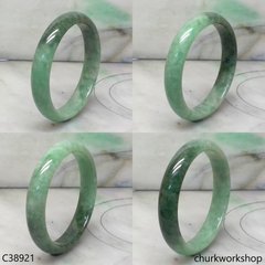 Small green base with splotches bluish green jade bangle