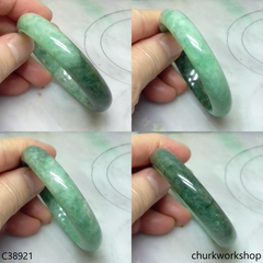 Small green base with splotches bluish green jade bangle
