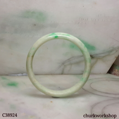 Small light green base with splotches apple green jade bangle