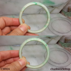 Small light green base with splotches apple green jade bangle