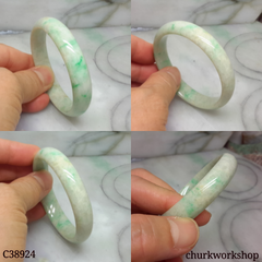 Small light green base with splotches apple green jade bangle