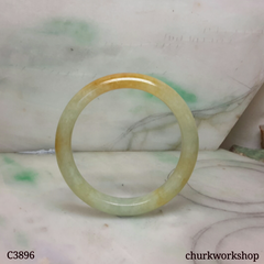 Small light green base with splotches red jade bangle