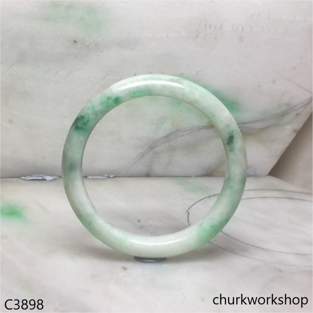 White base with splotches green jade bangle