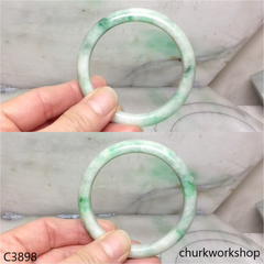 White base with splotches green jade bangle