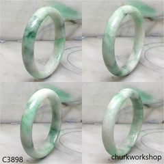 White base with splotches green jade bangle