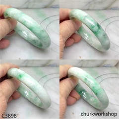White base with splotches green jade bangle