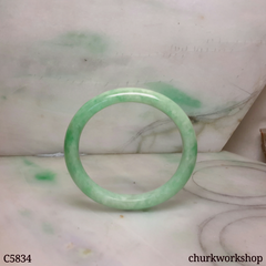 Small light apple green jade oval bangle