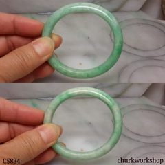 Small light apple green jade oval bangle
