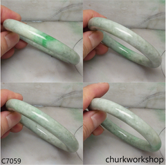 Light green with splotches green jade bangle