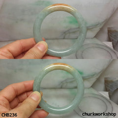 Light green with orange spot jade bangle