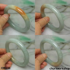 Light green with orange spot jade bangle