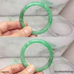 Small carved green jade bangle