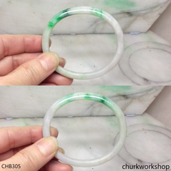 White base with splotches green & pale lavender jade bangle