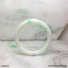 White base with splotches green jade bangle