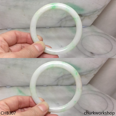 White base with splotches green jade bangle