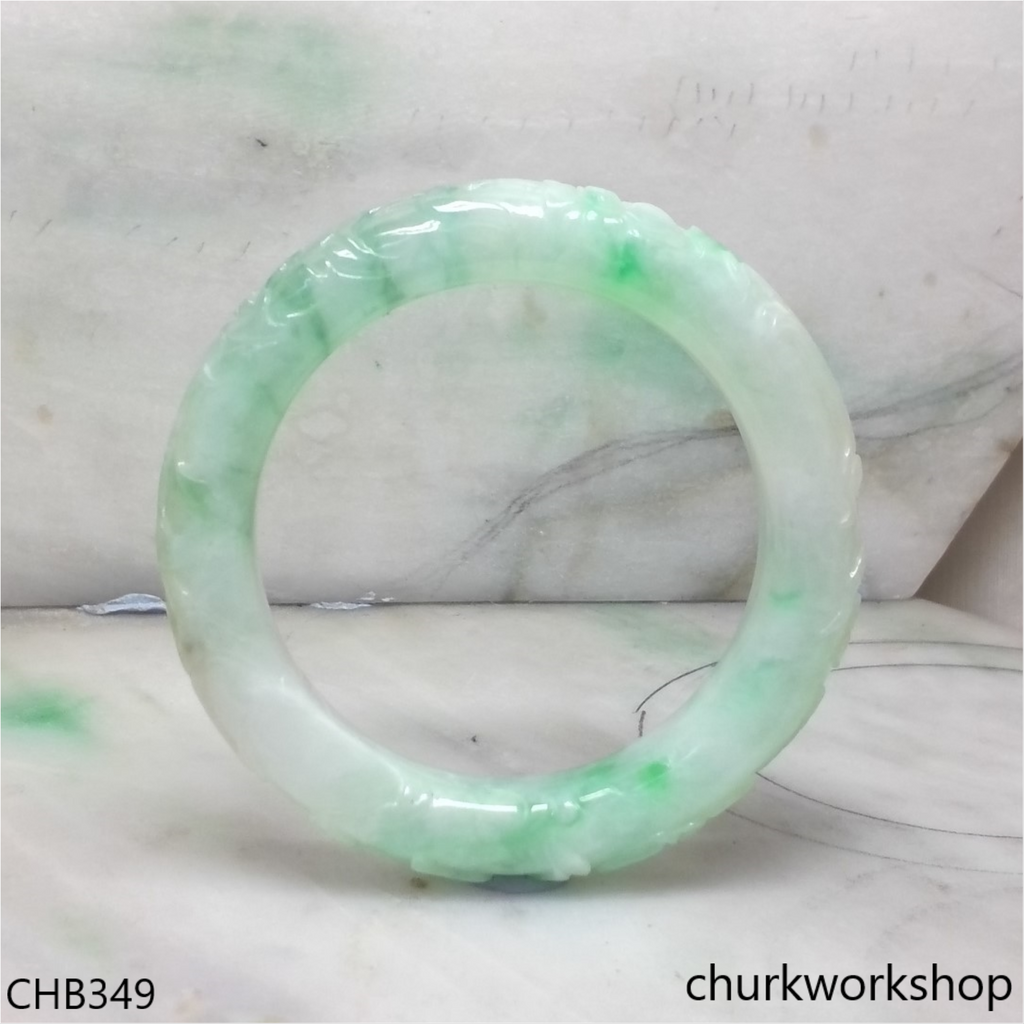 Light green carved jade bangle