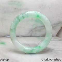 Light green carved jade bangle