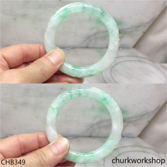 Light green carved jade bangle