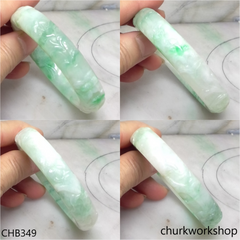 Light green carved jade bangle