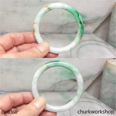 White base with splotches green & yellowish jade bangle