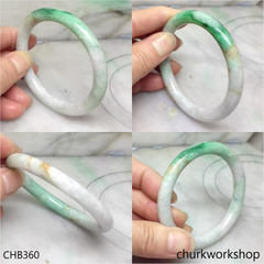White base with splotches green & yellowish jade bangle