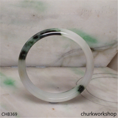 White base with splotches dark green bangle