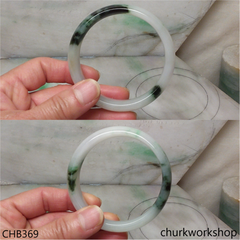 White base with splotches dark green bangle