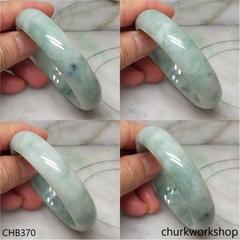 Light green with splotches bluish green jade bangle