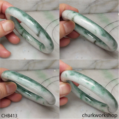 White base with bluish green splotches jade bangle