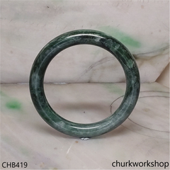 Light green with splotches bluish green jade bangle