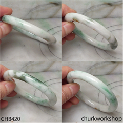 White base with splotches bluish green jade bangle