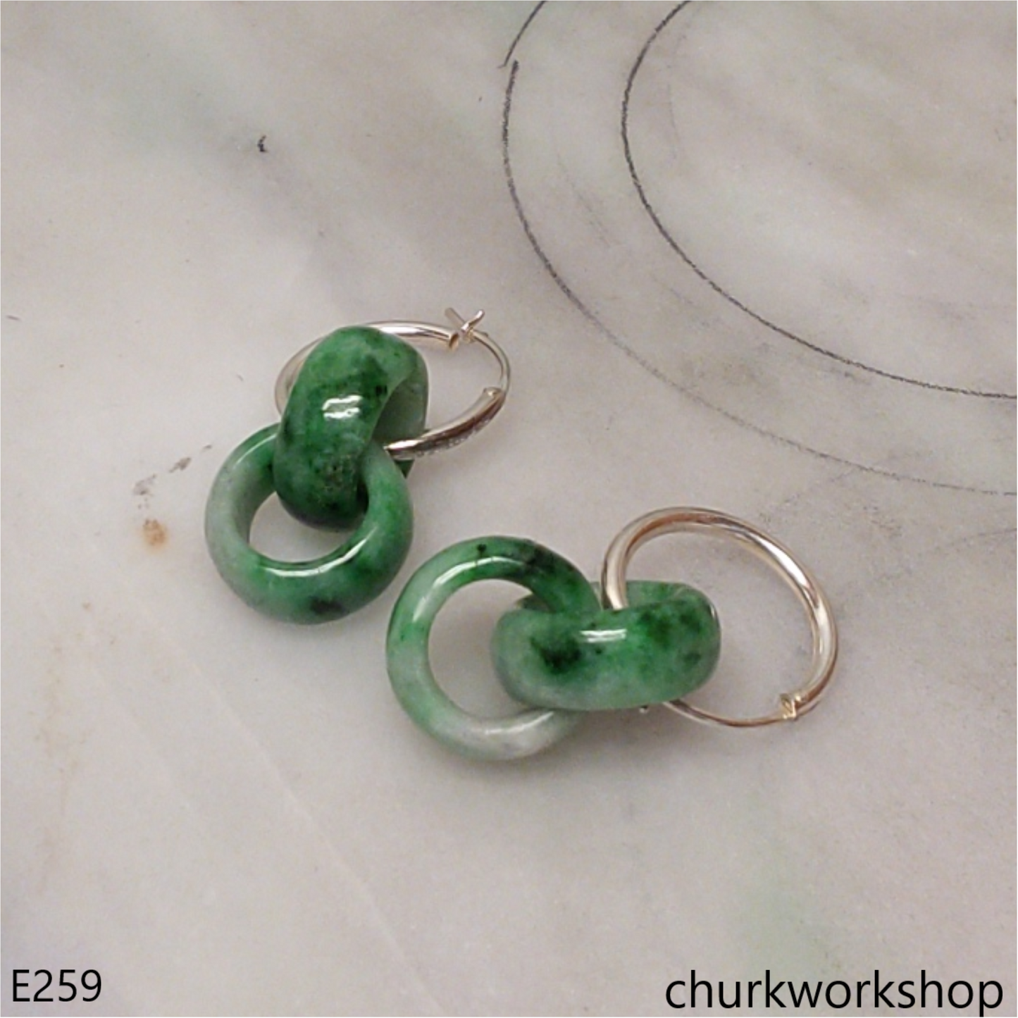 Green interlocking jade earrings