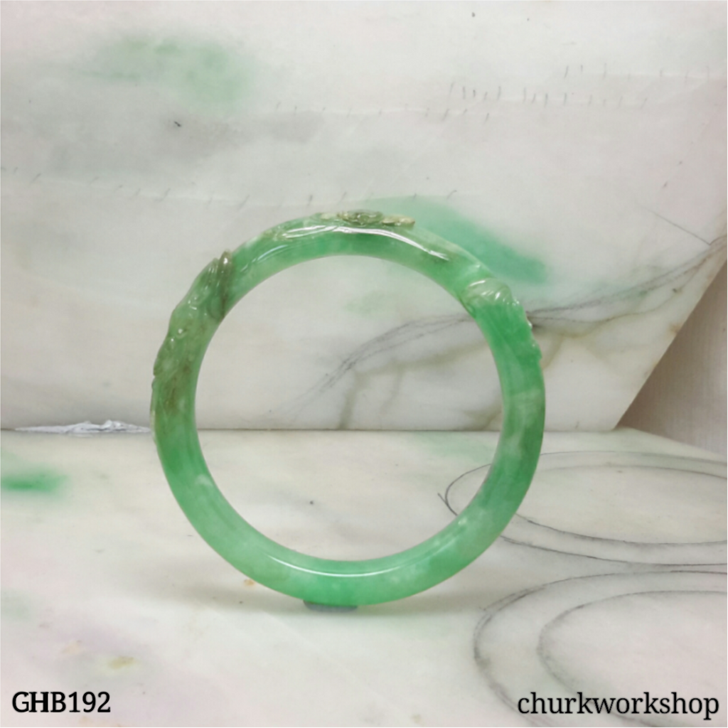 Small carved green jade bangle