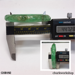 Small carved green jade bangle