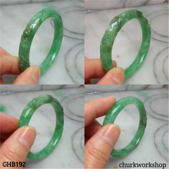 Small carved green jade bangle