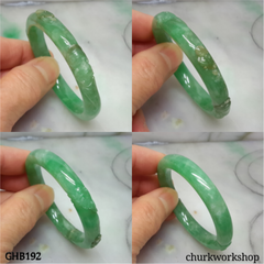 Small carved green jade bangle