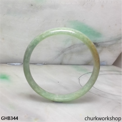 Small light pea green jade bangle