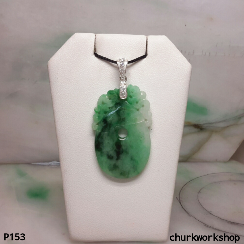 Carved jade pendant.