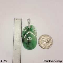 Carved jade pendant.