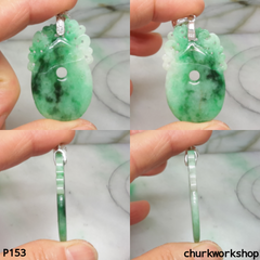 Carved jade pendant.