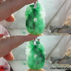 Carved jade pendant.